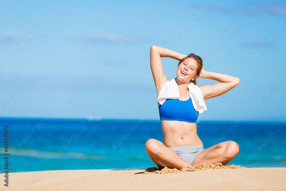 beautiful woman relaxing on the beach in Hawai beautiful woman relaxing on the beach in Hawai