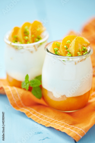 Fresh yogurt with apricots and pistachios