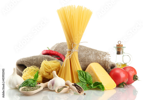 Pasta spaghetti, vegetables and spices, isolated on white