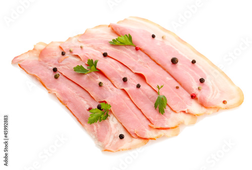 tasty bacon with spices, isolated on white