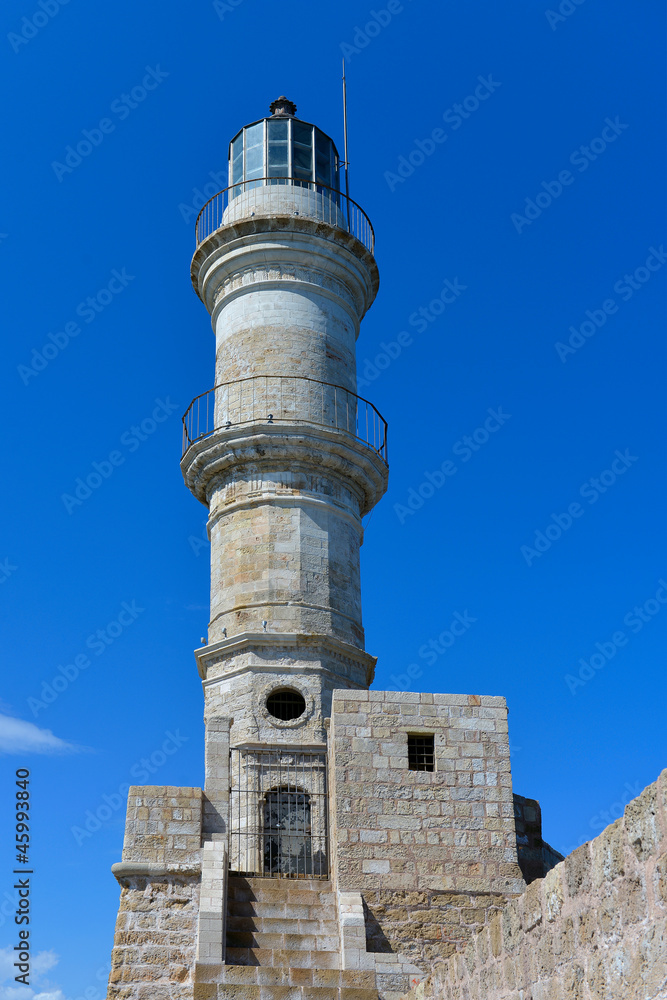 lighthouse against a blue sky