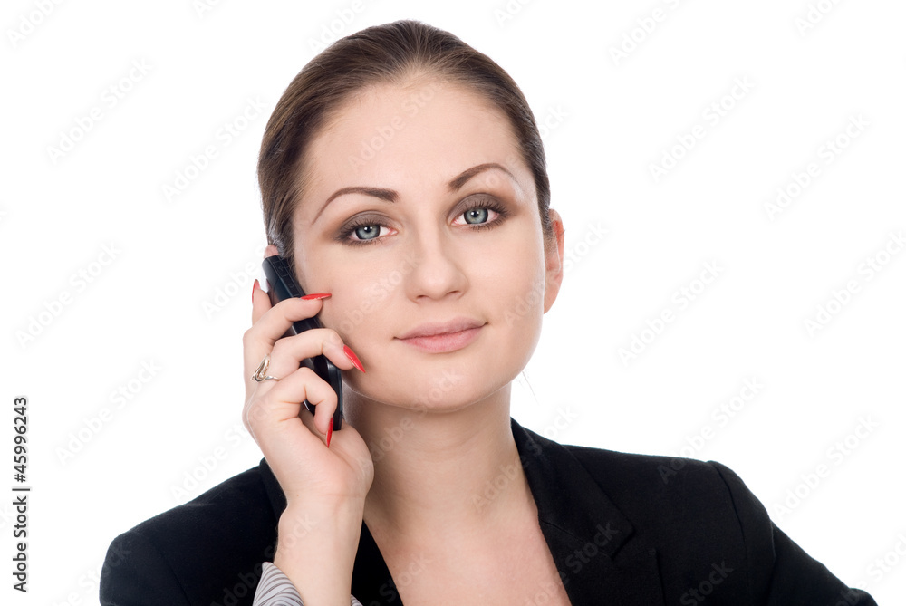 Happy businesswoman concentrating on cellphone call Happy businesswoman concentrating on cellphone call