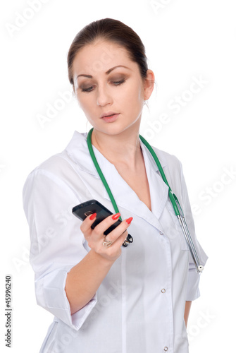 A young doctor with a mobile phone.