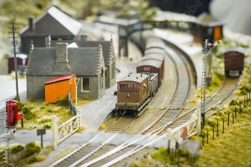 rural model railway station and train