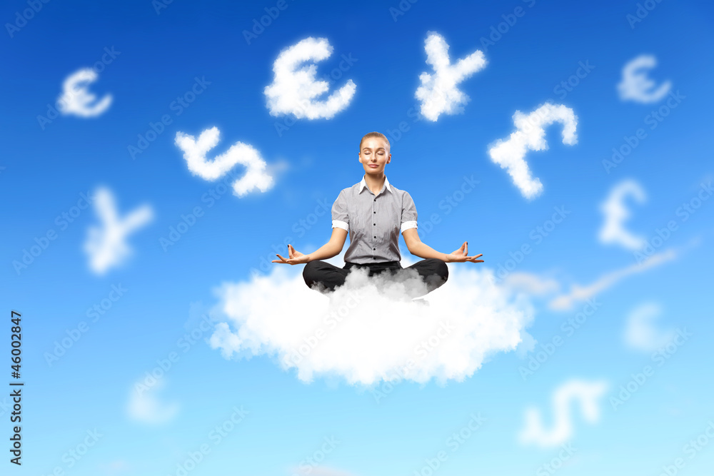 Businesswoman meditating sitting on the cloud Businesswoman meditating sitting on the cloud