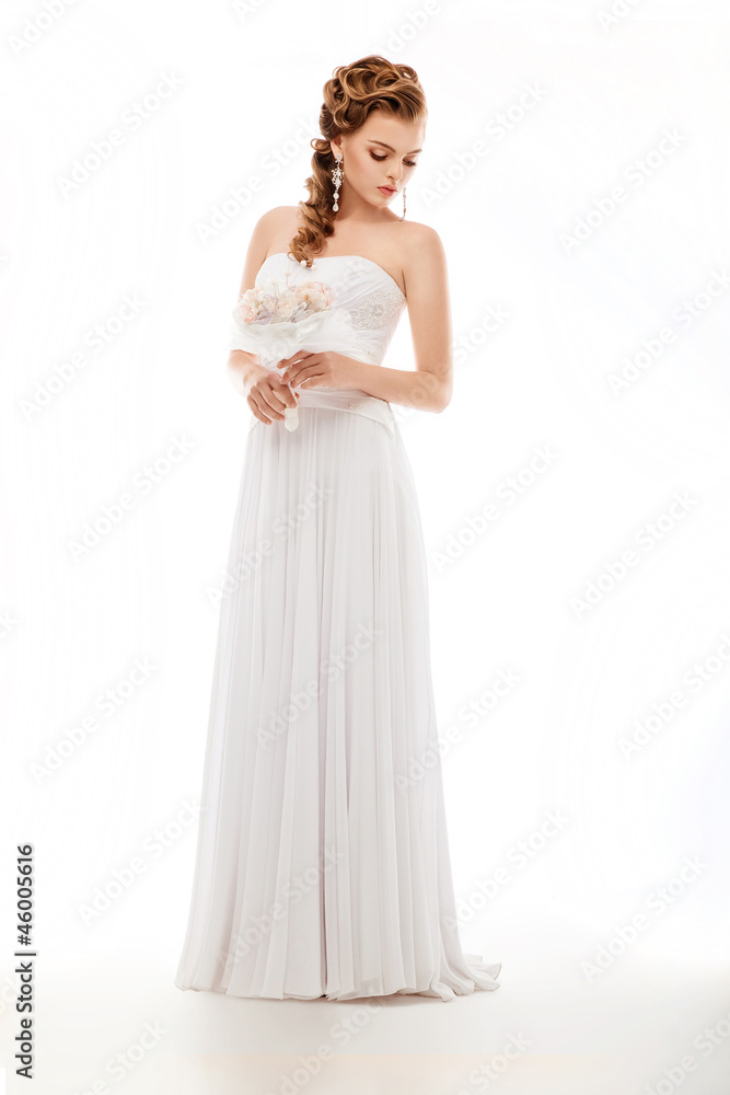 Beauty newlywed woman with wedding bouquet of flowers Beauty newlywed woman with wedding bouquet of flowers