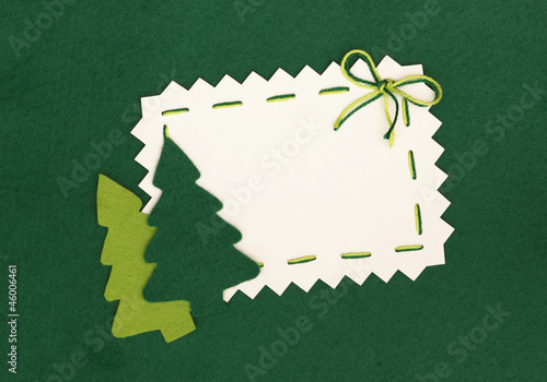 Christmas empty postcard  and new year trees on green background