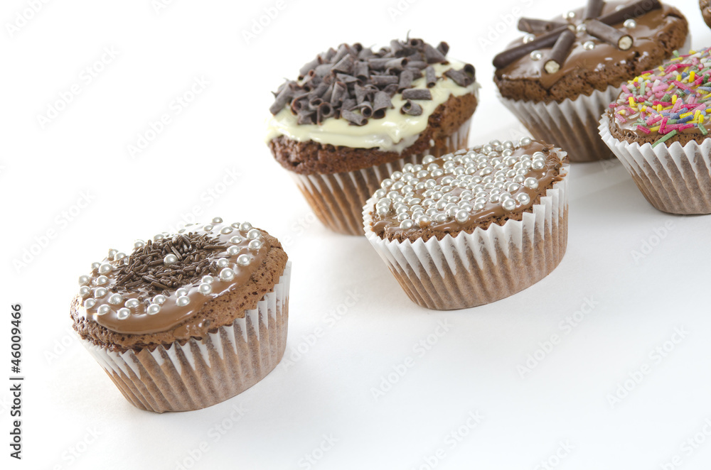 sweet muffins on white background
