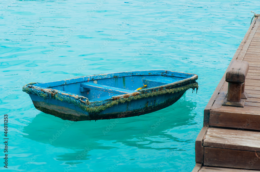 Fototapeta premium Boat on crystal sea