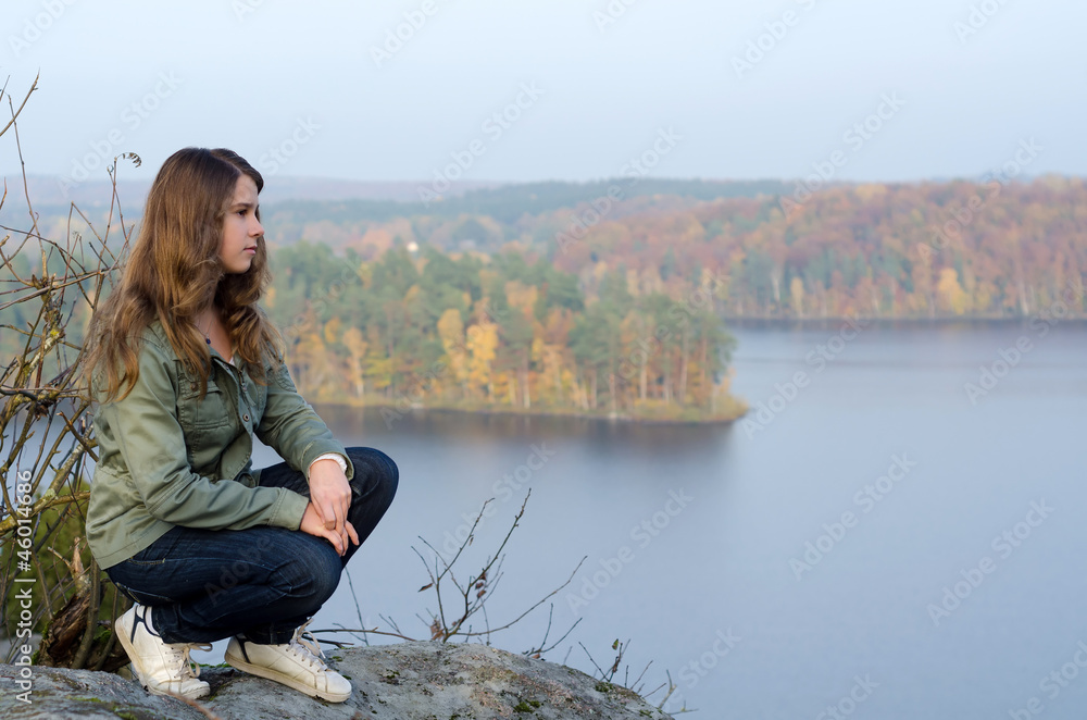 Beauty teen enjoy the autumn's lake view