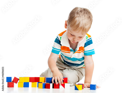 kid playing toy blocks  iso...