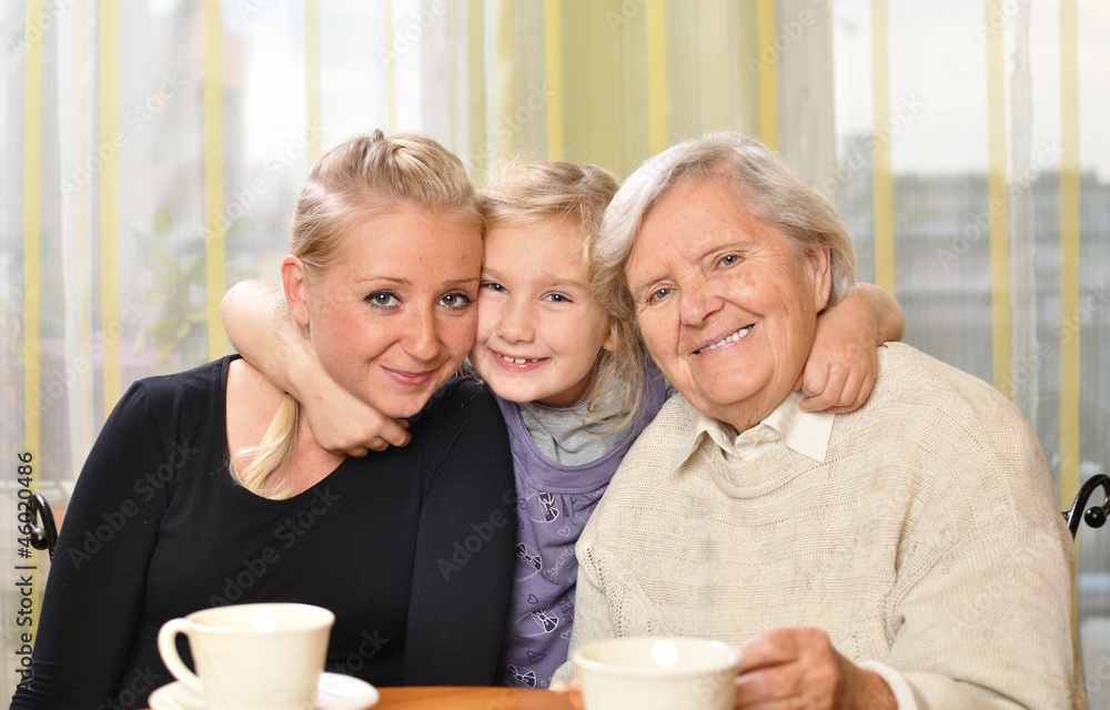 Three women - three generations. Happy and smiling. Three women - three generations. Happy and smiling.