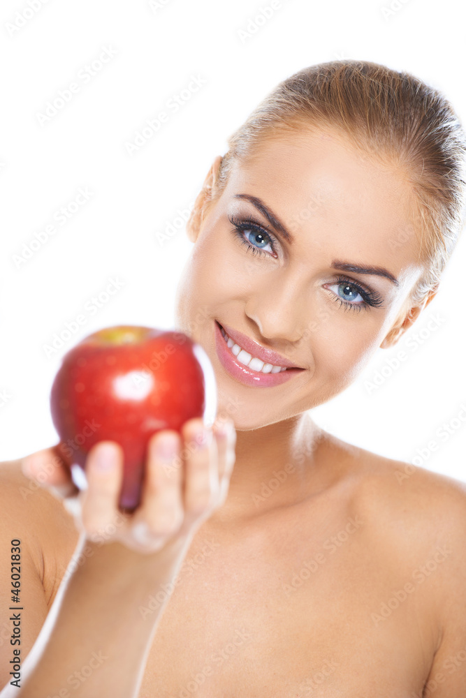 Smiling beauty holding red apple Smiling beauty holding red apple