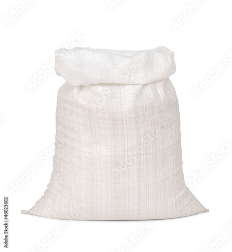 White canvas sack with full paddy isolated on white background photo