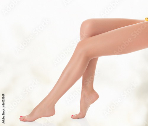 Legs of a woman against abstract background © Nobilior