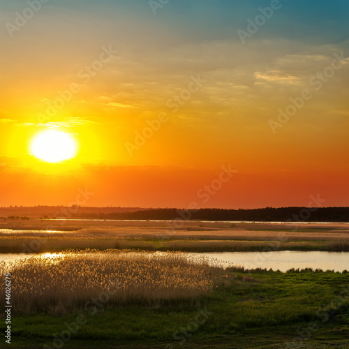 good orange sunset over river © Mykola Mazuryk