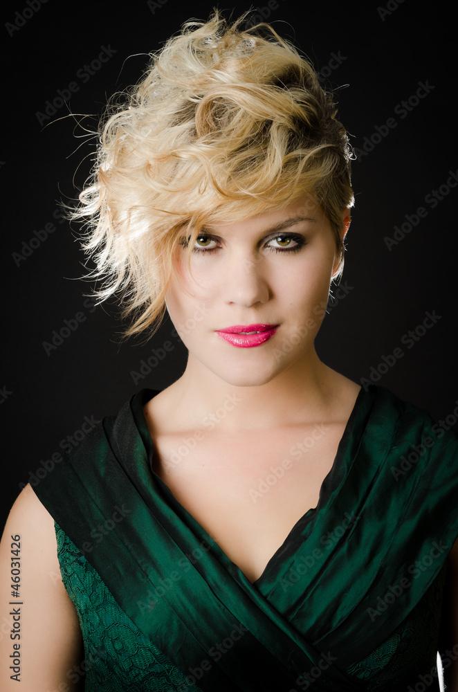 Beautiful blonde woman in green dress Beautiful blonde woman in green dress