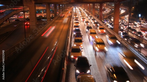 Cars running on highway roads are busy