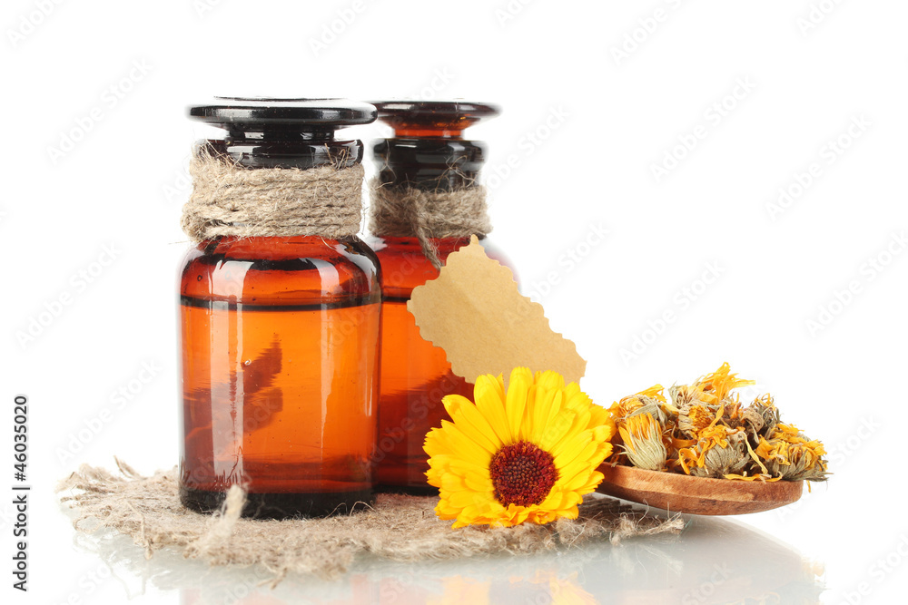 medicine bottles and calendula, isolated on white medicine bottles and calendula, isolated on white