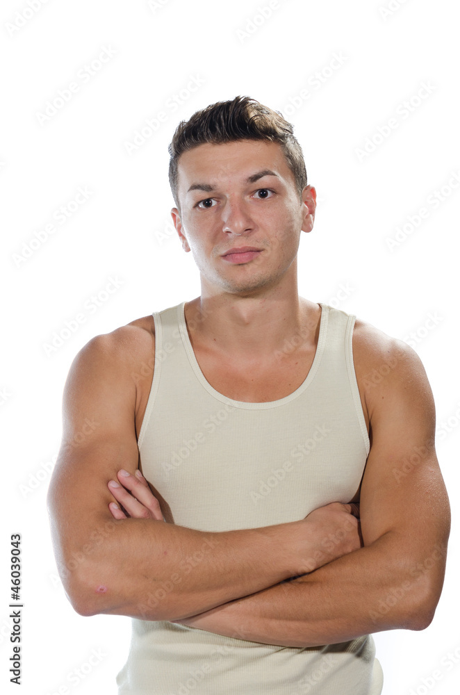 Young muscular man wearing sleeveless shirt Young muscular man wearing sleeveless shirt