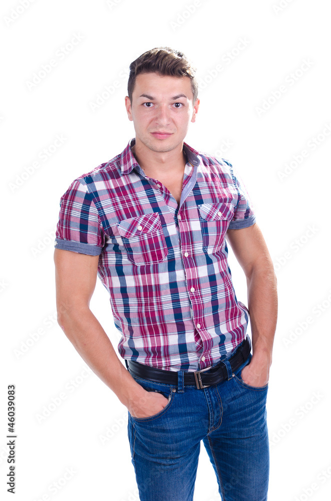 Portrait of young man with his hands in pockets Portrait of young man with his hands in pockets