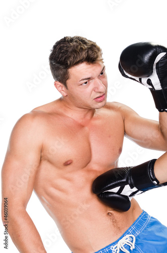 Young man boxing