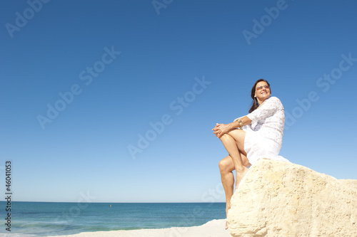 Middle aged woman ocean background