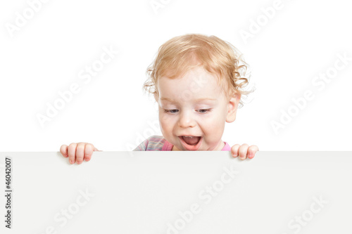Billede på lærred kid looking down behind white emty banner isolated