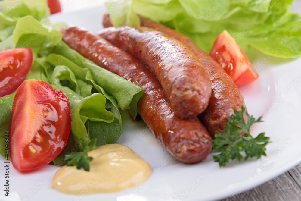 grilled sausage and salad