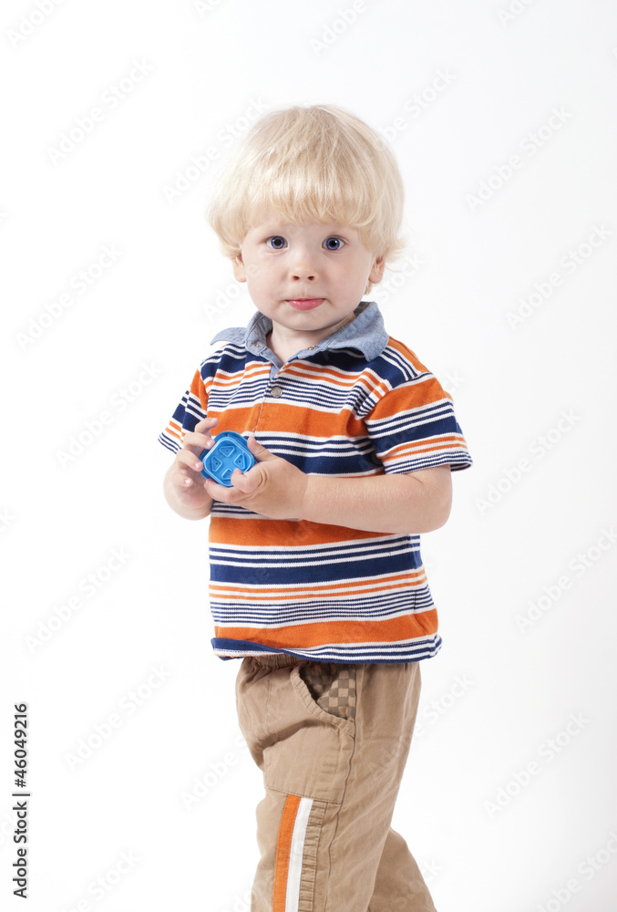 Blonde child playing educational toys isolated on white Blonde child playing educational toys isolated on white