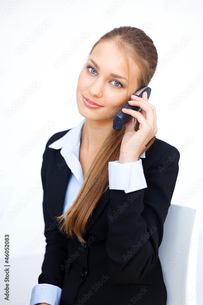 Portrait of cute young business woman talking on the cell phone Portrait of cute young business woman talking on the cell phone