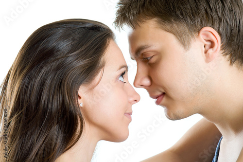 Young man and woman looking for tenderness and closeness