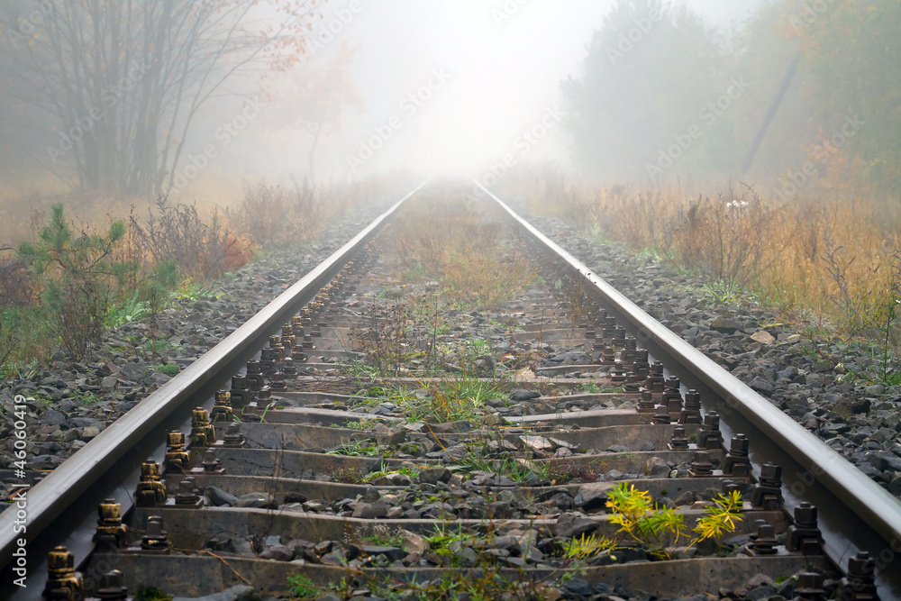 Fototapeta premium Train rails in foggy weather in Poland