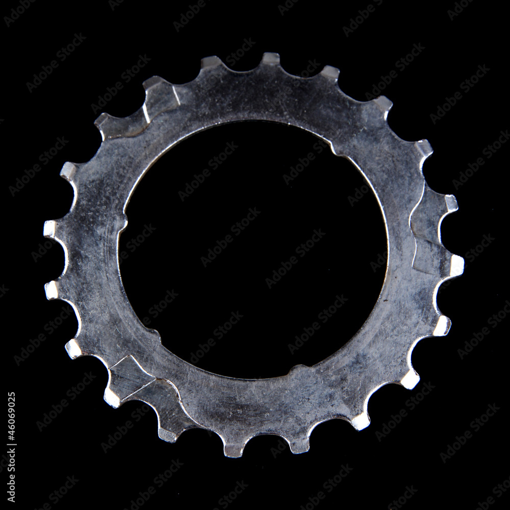 Metal cogwheel on black background Metal cogwheel on black background