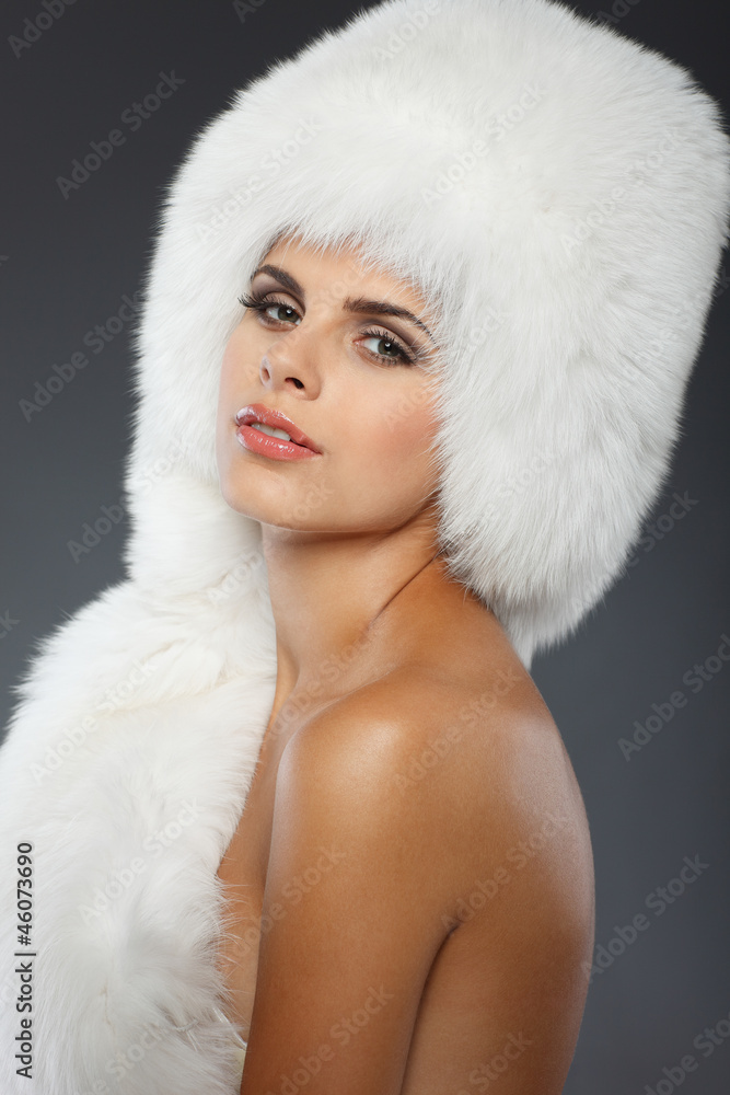 A photo of sexual beautiful girl is in fur clothes