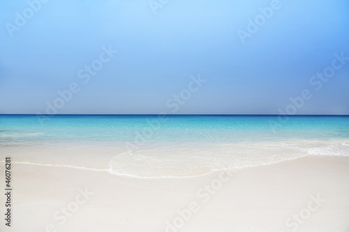 Fototapeta Naklejka Na Ścianę i Meble -  The island of dreams. Rest and relaxation. White sand and azure