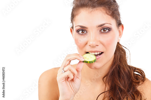 Woman with cucumber