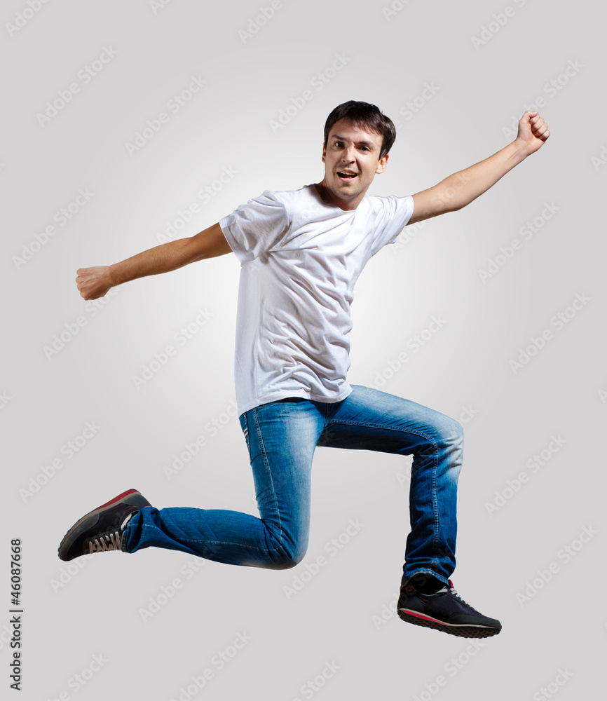 Young man dancing and jumping Young man dancing and jumping