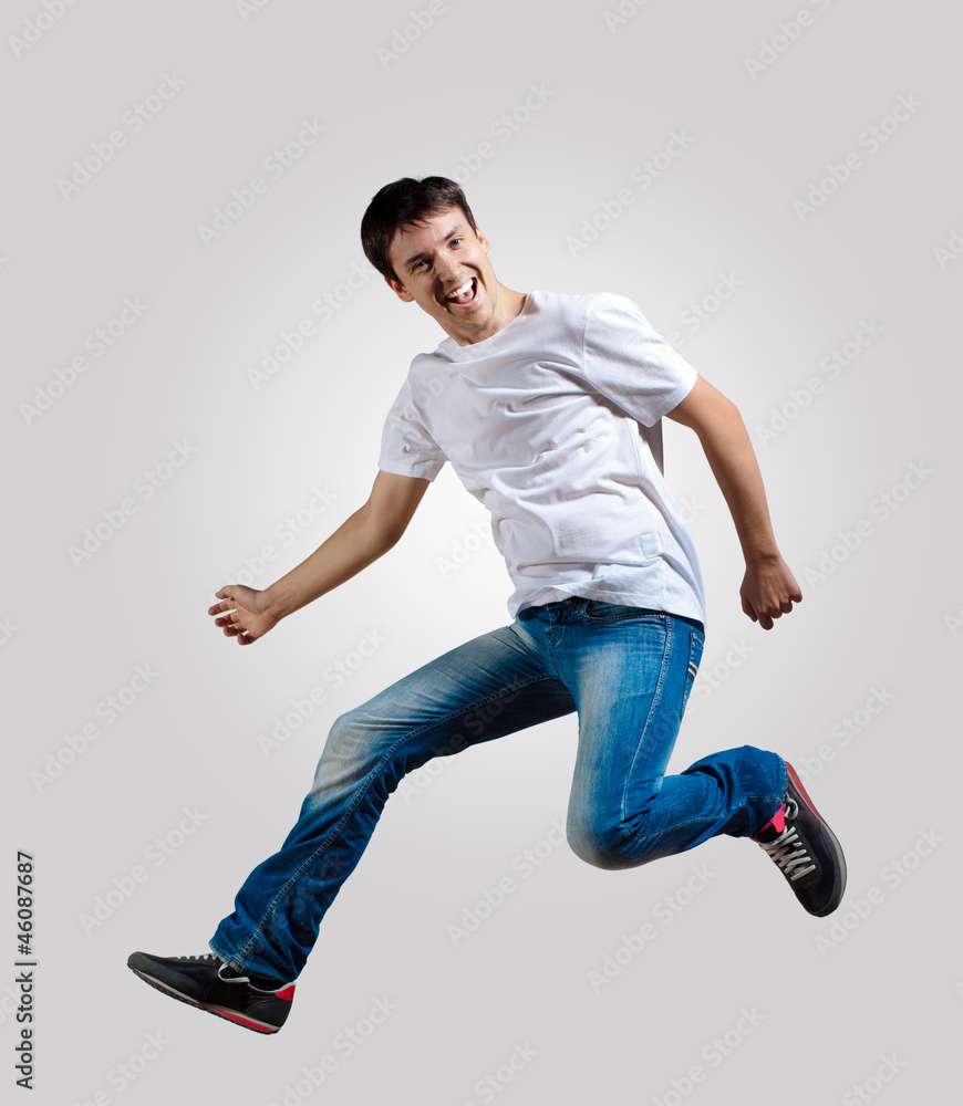 Young man dancing and jumping Young man dancing and jumping