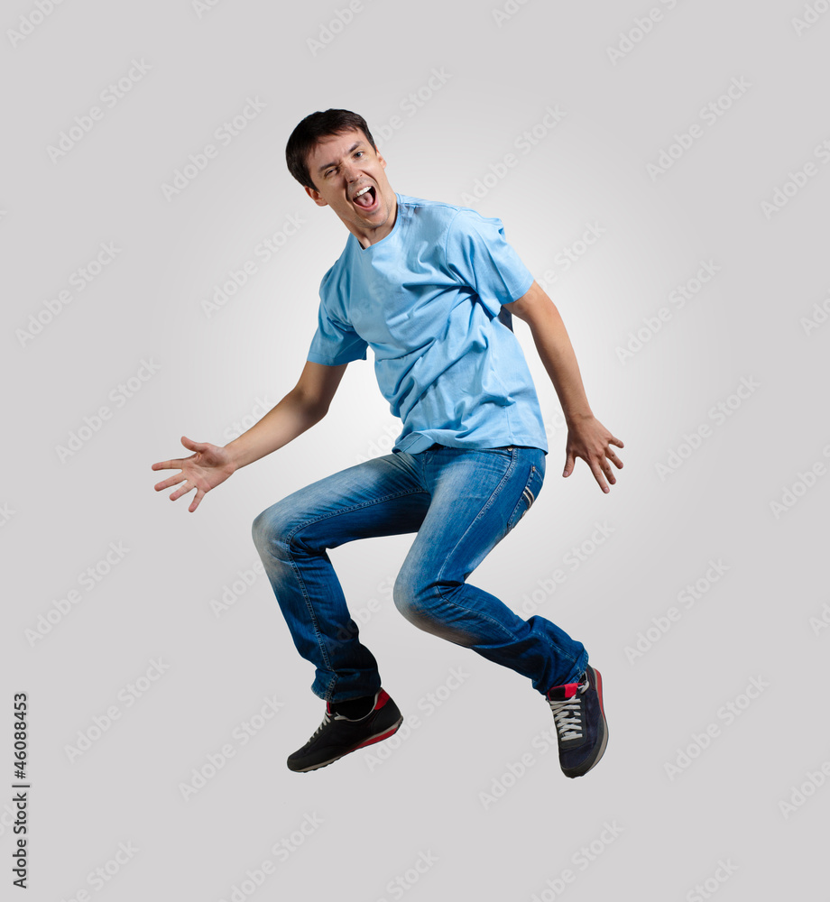Young man dancing and jumping Young man dancing and jumping