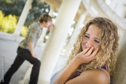 Wallpaper Mural Woman Upset While Man Comtemplates in the Background Torontodigital.ca