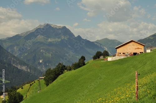 Landscape with wooden agriculture house in Tyrol, Austria.
