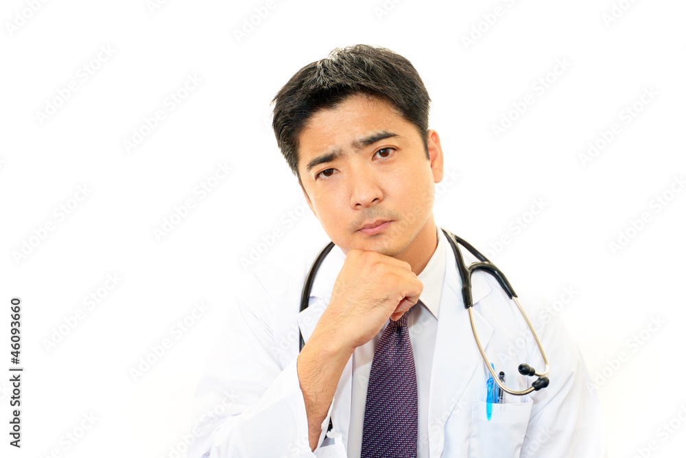 困惑した表情の医師 困惑した表情の医師