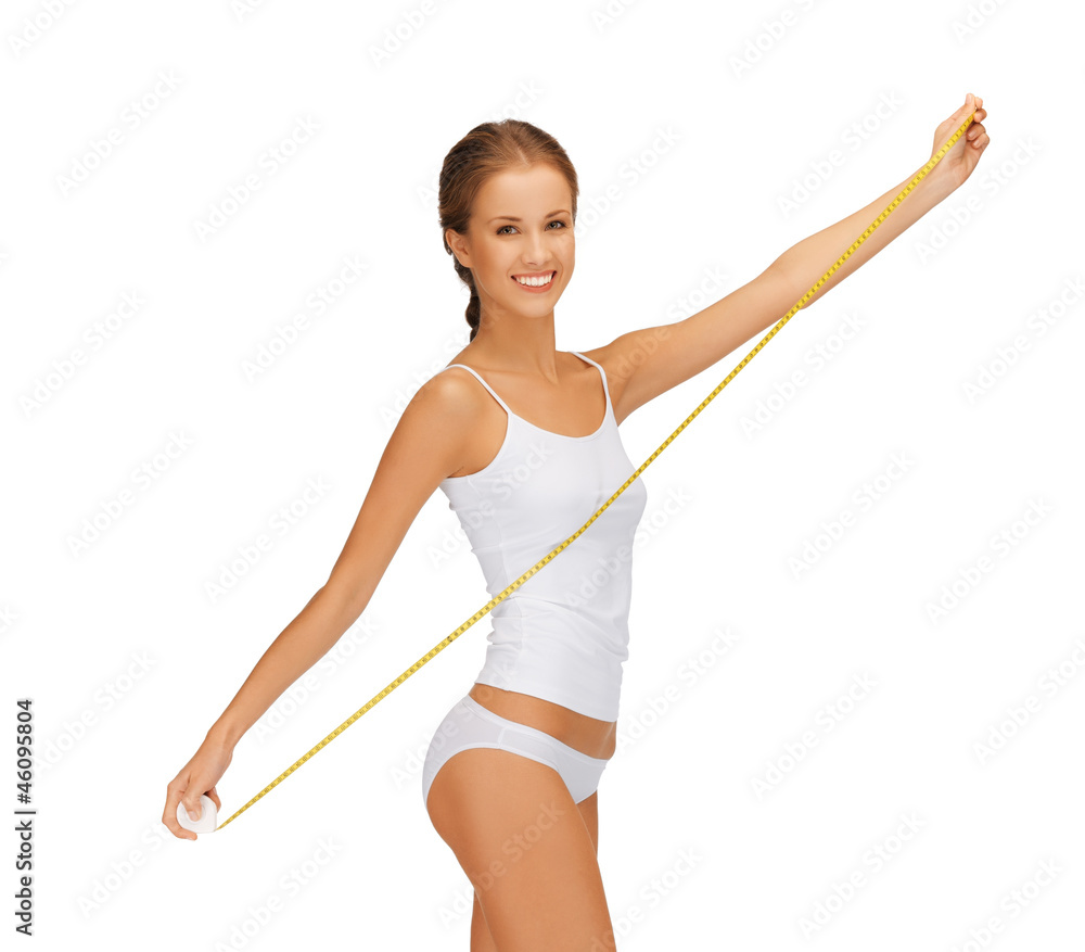 young beautiful woman with measure tape young beautiful woman with measure tape
