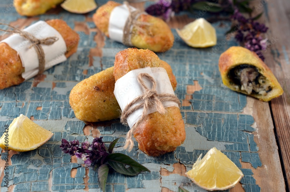Fried rolls with fish and pesto sauce Fried rolls with fish and pesto sauce