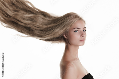 Blond beauty on white
