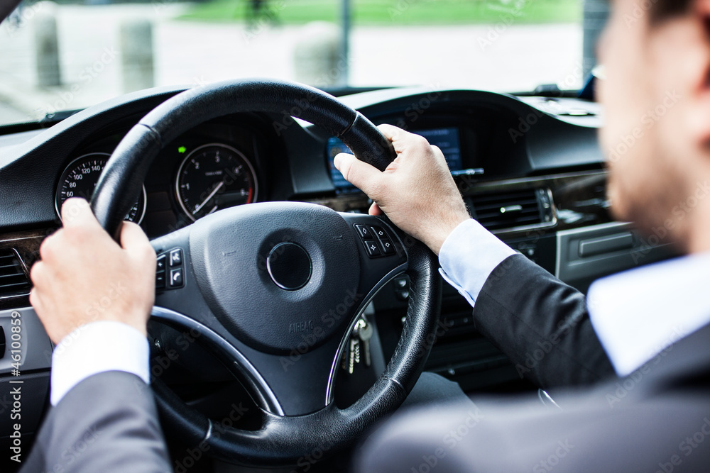 Naklejka premium Man driving his car