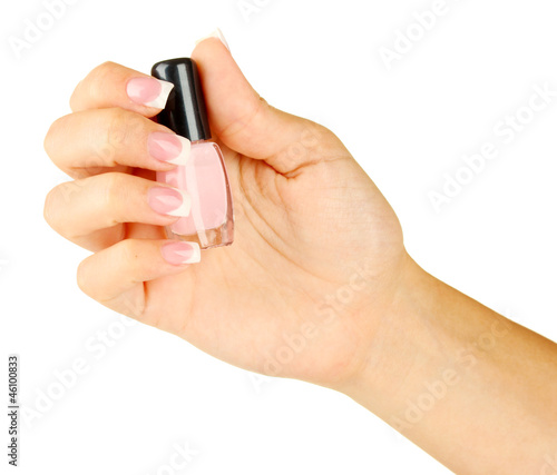Beautiful woman's hands with jar of nail polish,