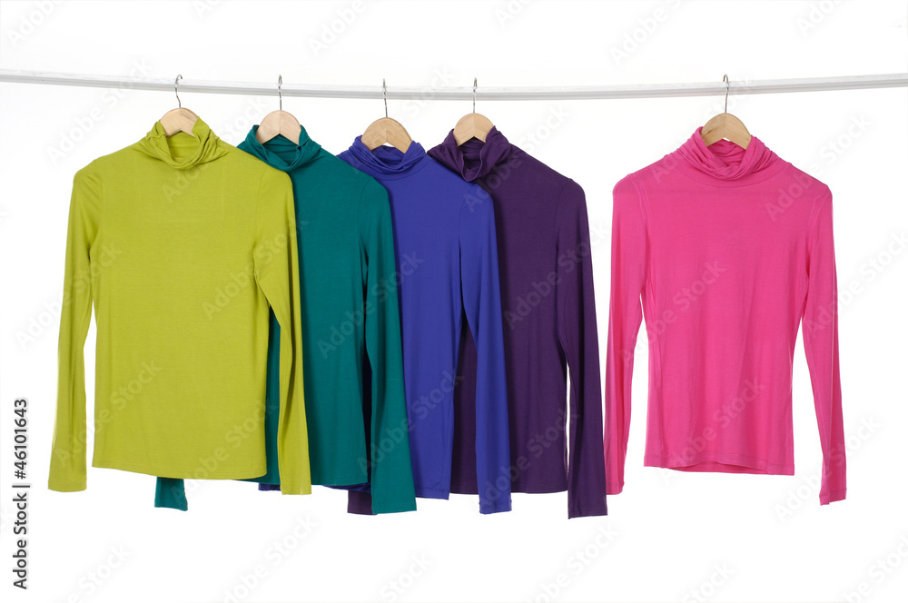 colorful clothing on hanger in a row colorful clothing on hanger in a row