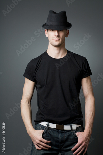 Young handsome guy in black t-shirt.